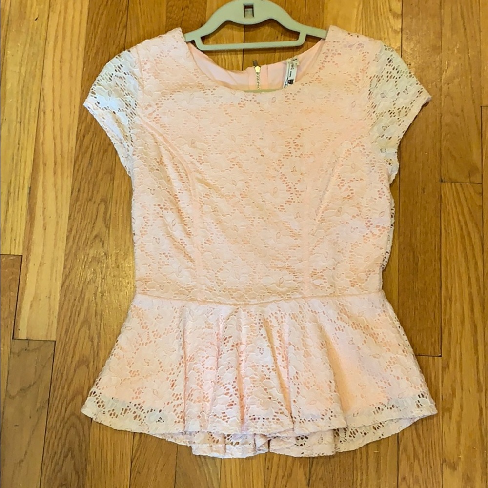 Pink lace peplum shirt